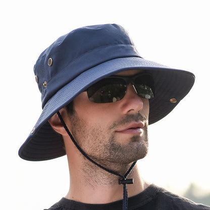 Navy big-brim sun hat with chin strap and metal eyelets