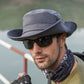 Light gray wide-brim sun hat with chin cord and metal eyelet buttons