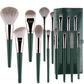 Makeup brush set with green handles and silver ferrules, with green brush holder