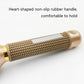 Ceramic roller hair brush handle with textured grip and gold barrel end