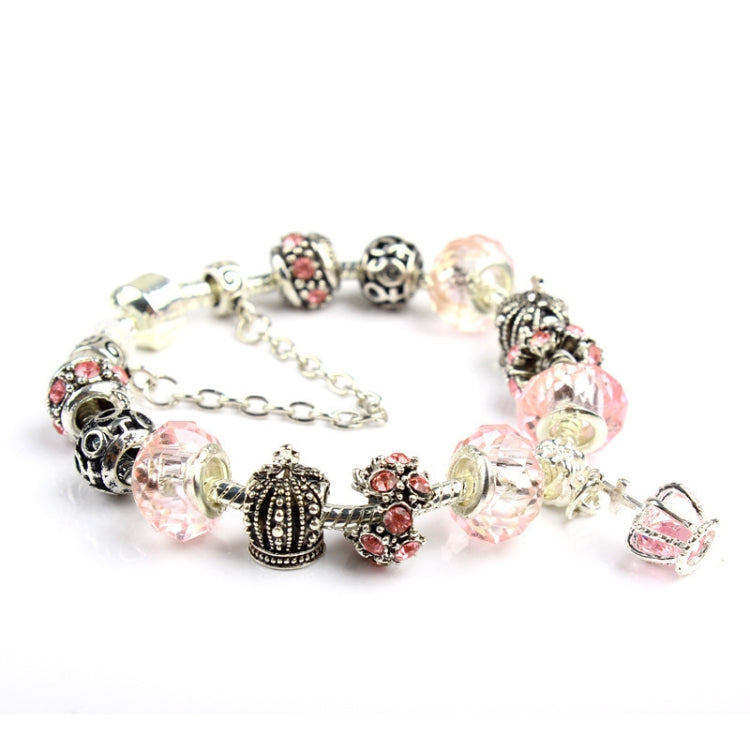 Charm bracelet with pink and clear glass beads, crown charm, silver-tone chain