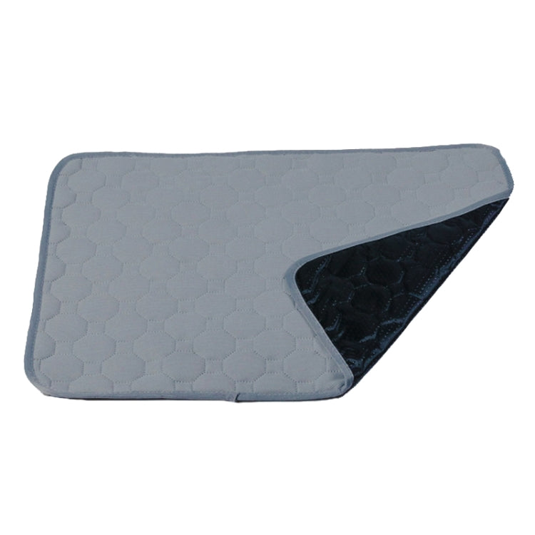 Waterproof pet pad with textured hex fabric, light gray top and black waterproof side