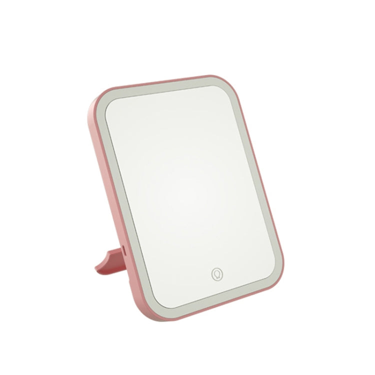 Portable folding LED makeup mirror with lamp, pink frame, angled desktop stand
