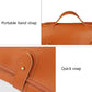 Brown knife storage roll bag with portable hand strap and snap buckle closure