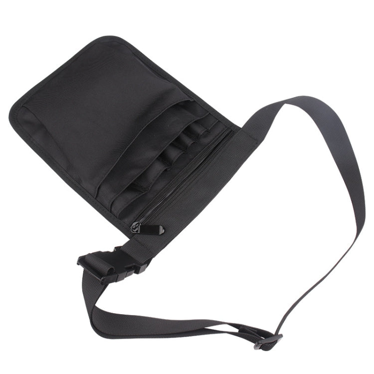 Black medical organizer crossbody bag with adjustable strap and fold-over flap
