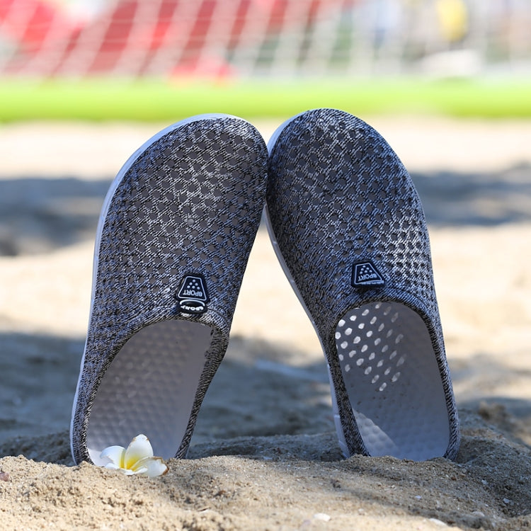 Breathable half slipper shoes in dark navy knit with textured dots and heel tabs