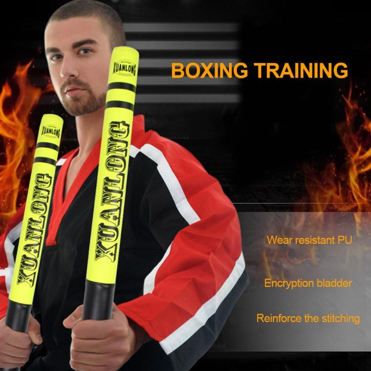 Fluorescent green PU boxing stick speed targets held during training with red pads