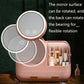 Pink desktop makeup storage box with rotating mirrors and LED light, open storage