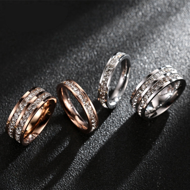 Set of girls’ diamond band rings in silver and rose gold tones, side view