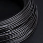 5mm braided cable tube, black with silver-thread weave, close-up of coiled strands