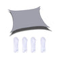 Light gray outdoor shade sail with corner grommets and white hanging ropes