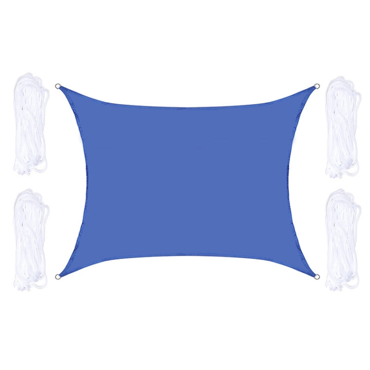 Blue outdoor shade sail with corner grommets and white hanging ropes