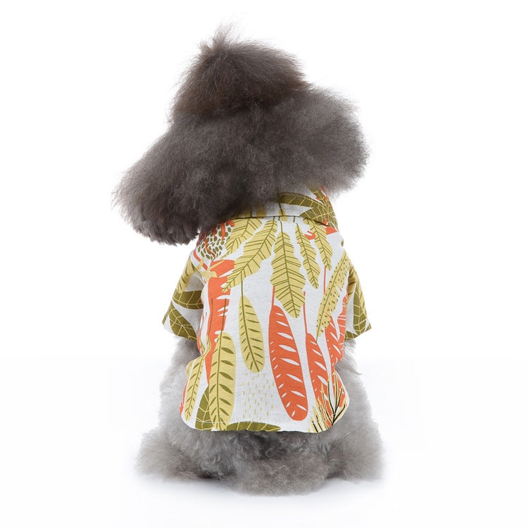 Dog summer shirt with white base and colorful leaf print