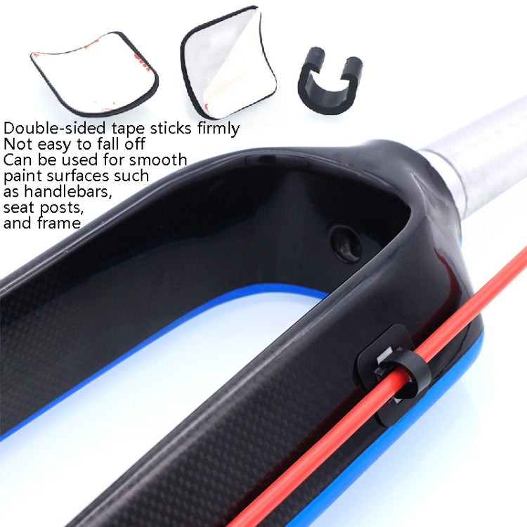 Bicycle seat frame cable guide clip with adhesive tape, holding red wire