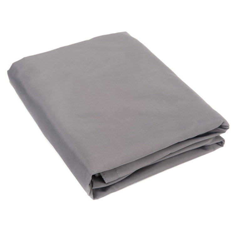 Grey waterproof sunshade sail canopy folded for storage, with neatly layered edges