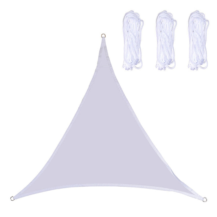 Triangle sunshade sail in white with corner grommets and hanging ropes.