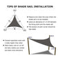Triangular outdoor shade sail, dark gray fabric with corner support points and seams