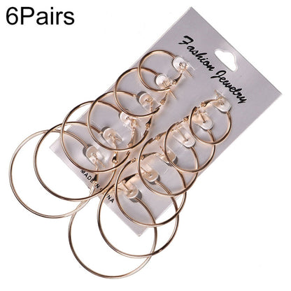 6-pack steampunk circle hoop earrings, gold-tone metal, multiple pairs on card