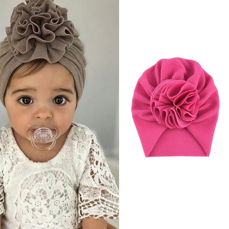 Baby turban hat in hot pink with textured rosette flower, one size