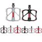 Set of carbon fiber bicycle platform pedals in silver and black color options.