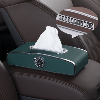 Car clock tissue box with tissue, green front panel and round clock dial.