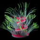 Fluorescent simulated coral anemone with blue tentacles, green tips, and red/pink accents