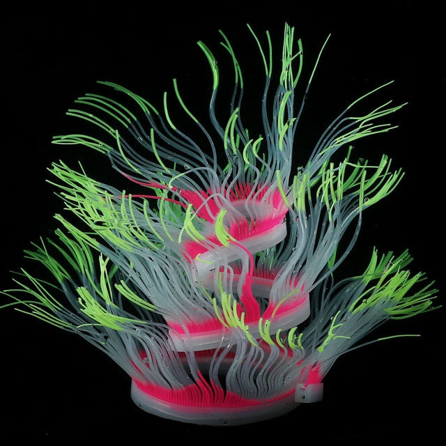 Fluorescent simulated coral anemone with blue tentacles, green tips, and red/pink accents