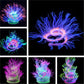 Fluorescent anemone coral decoration with long tentacles, glowing pink and blue