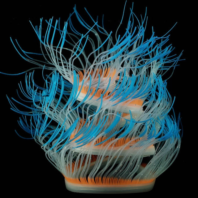 Fluorescent aquarium anemone decoration with blue tentacles and orange core accents