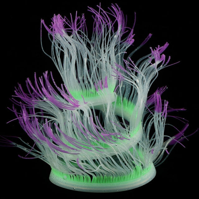 Fluorescent aquarium anemone decoration with purple tentacles and bright green base glow