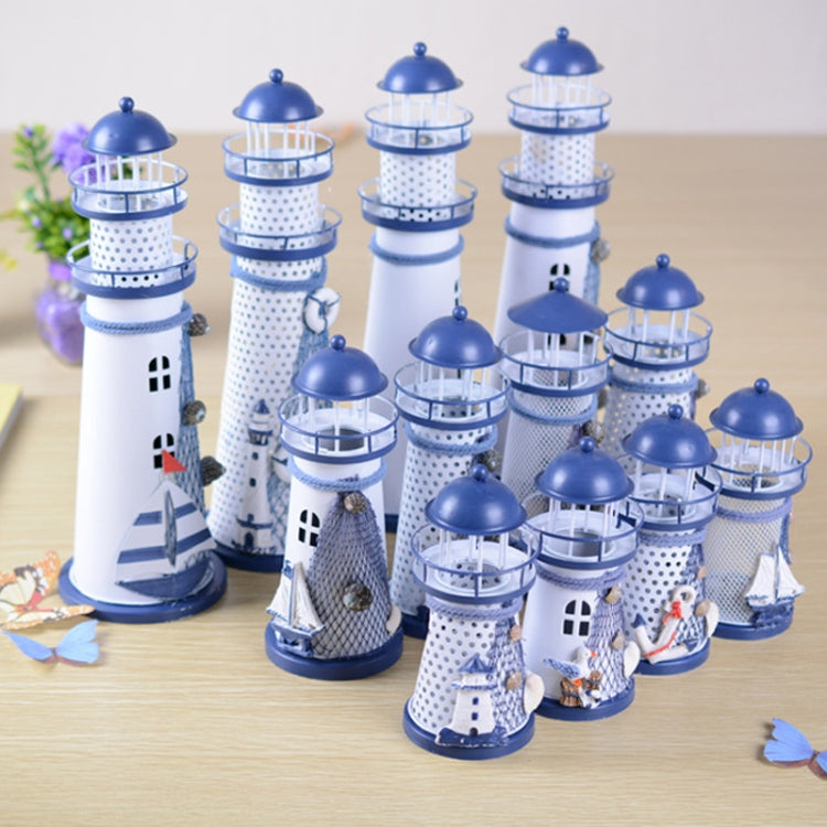 Set of blue and white tin lighthouse decorations with mesh towers and domed lantern tops