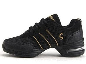 Black breathable dance sneakers with gold stripe accents and lace-up closure