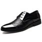 Men's leather lace-up dress shoes, black front three-quarter view with low heel.