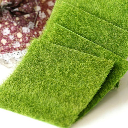 Green artificial turf mat with short faux moss fibers, folded corner view