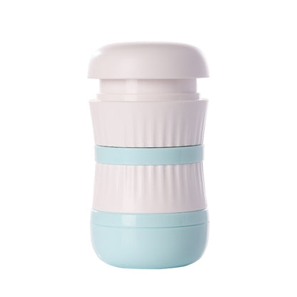 Pill grinder and cutter box with white lid and light blue base, blue band detail