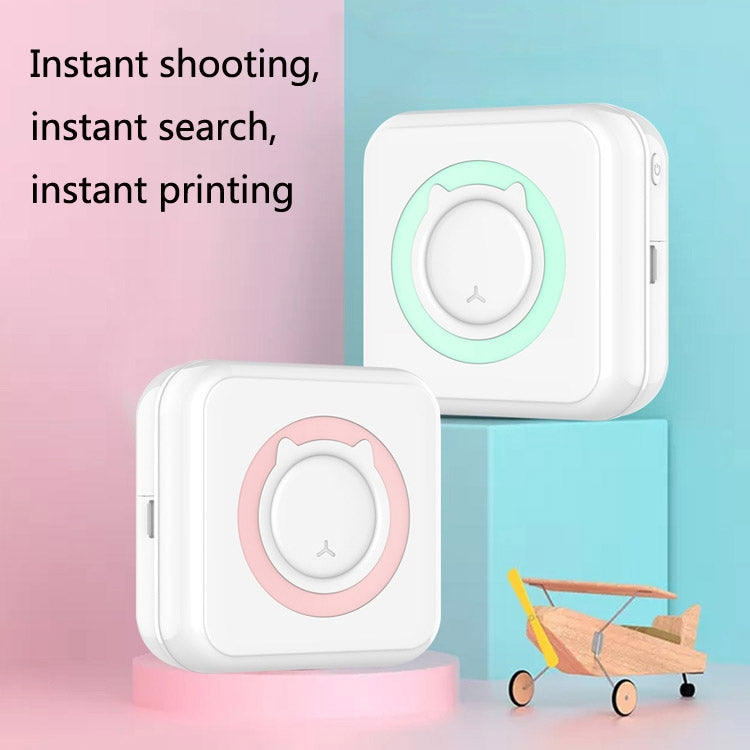 Two portable mini thermal printers, white bodies with mint and pink front rings