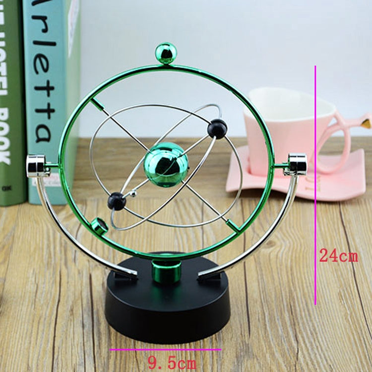 Rotating magnetic globe ornament with green ring, teal globe sphere, and black base