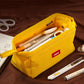 ANGOO yellow pencil pouch open with zipper, holding pens and stationery
