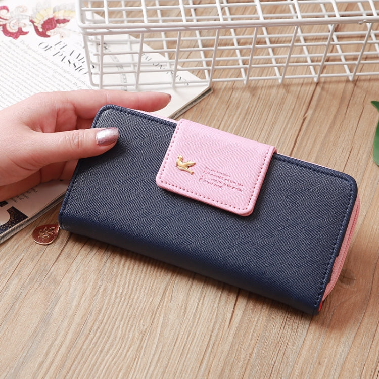 Long zipper wallet with card slots, navy blue exterior and pink flap with logo.