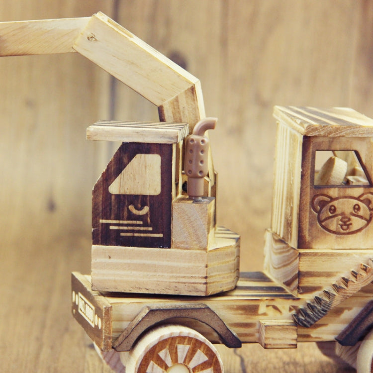 Wooden model excavator toy ornament with side cab door and arm detail, light wood