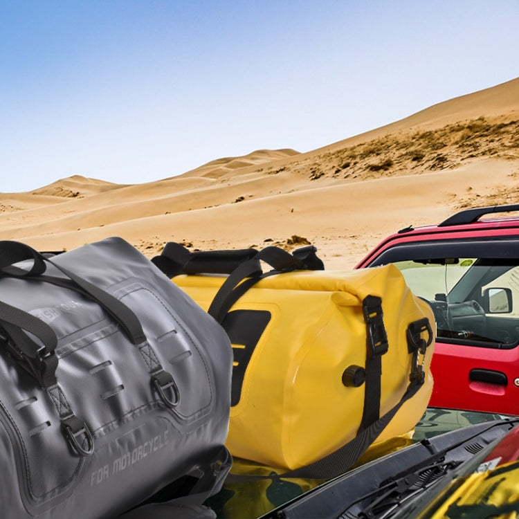 Yellow and black waterproof motorcycle rear-seat duffel bag mounted on a bike