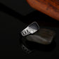 Silver-tone ring with black enamel top, rectangular accents, and rhinestone detail