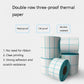 Thermal barcode label rolls set with white stickers and teal grid outlines
