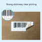 Barcode thermal label partially peeled from backing on brown test board