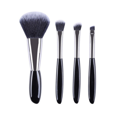 Black makeup brush set of four soft bristle brushes with silver handles