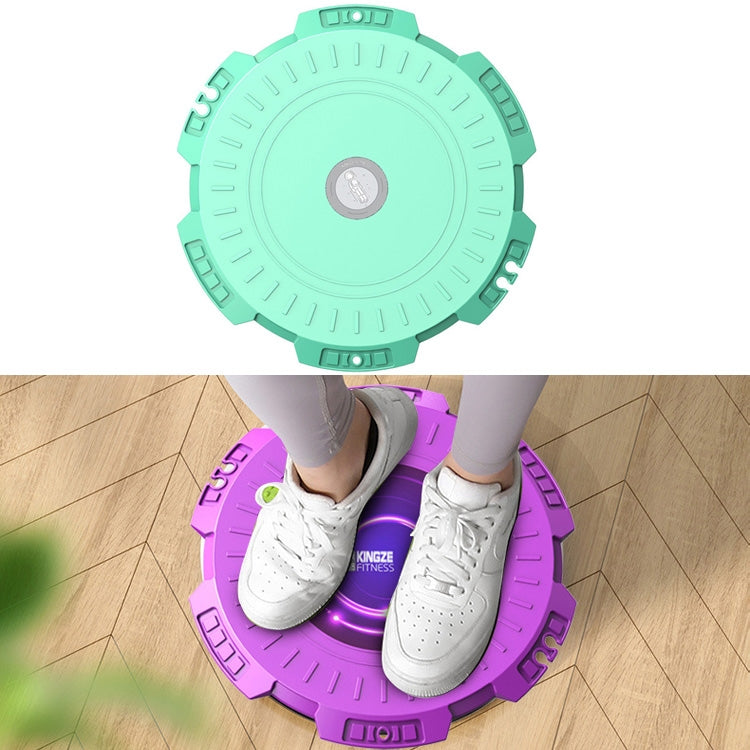Green waist twist fitness board with textured outer rim and LED center light