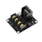 Heated bed MOSFET driver PCB with four gold terminals and heat-sinked MOSFETs