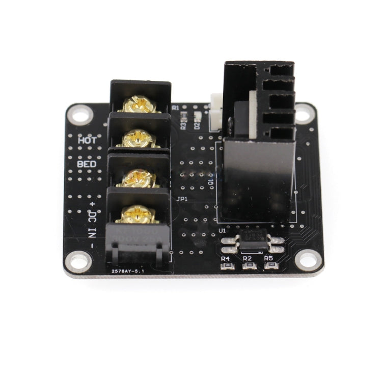 Heated bed MOSFET expansion PCB with heatsinks and circuit components on a black board