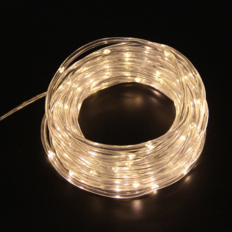 Cool white LED tube string lights with clear flexible tube, coiled loop view