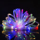 Multicolor LED tube string lights with glowing bulbs in a circular burst loop